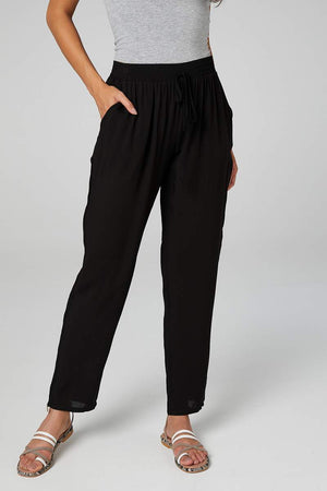 TIE WAIST SLIM LEG TROUSERS
