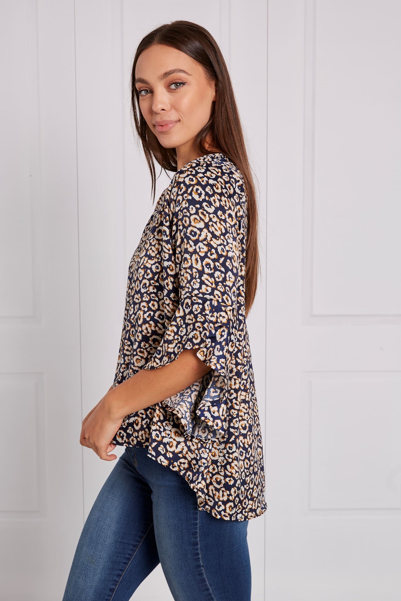 ANIMAL PRINT FLUTE SLEEVE BLOUSE