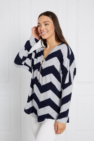 CHEVRON PRINT ZIPPER TOP