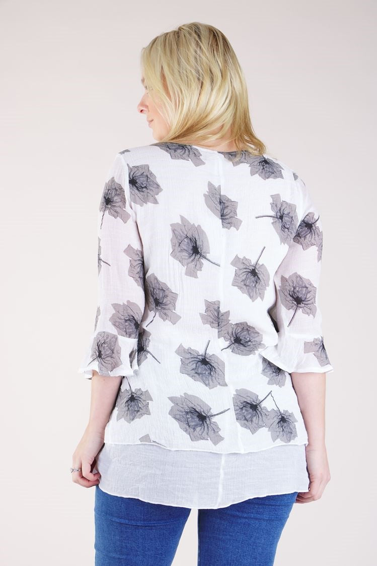FLORAL ASYMMETRICAL HEM TOP